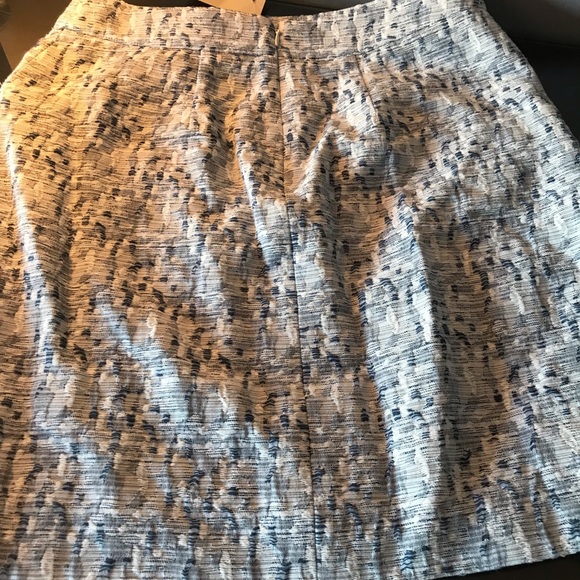 Mini tweed skirt with pockets - Picture 3 of 3